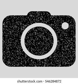 Photo Camera grainy textured icon for overlay watermark stamps. Flat symbol with dirty texture. Dotted vector black ink rubber seal stamp with grunge design on a light gray background.