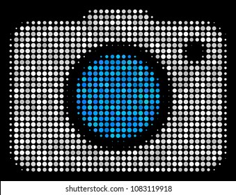 Photo camera halftone vector icon. Illustration style is pixelated iconic photo camera symbol on a black background. Halftone matrix is constructed with round cells.