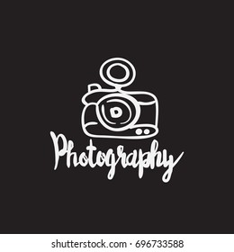 photo camera hand drawn icon with lines and lettering design on background. graphic vector illustration