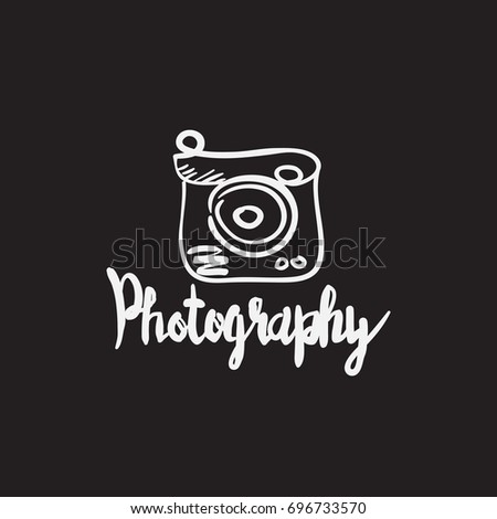 photo camera hand drawn icon with lines and lettering design on background. graphic vector illustration
