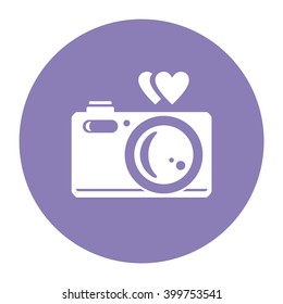 Photo camera with heart. Vector icon. Color illustration.