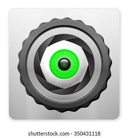 Photo camera with human eye on a white background.