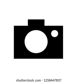 Photo camera icon. Black on white series.