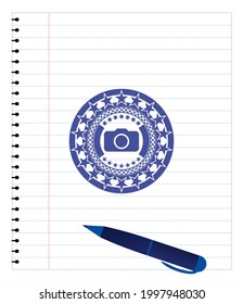 photo camera icon emblem draw with pen effect. Blue ink. Vector Illustration. Detailed. 