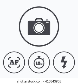 Photo camera icon. Flash light and autofocus AF symbols. Stopwatch timer 10 seconds sign. Icons in circles.