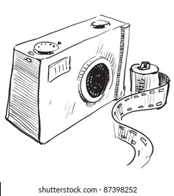 Photo camera icon. Hand drawing cartoon sketch illustration in childish doodle style