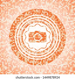 photo camera icon inside abstract emblem, orange mosaic background
