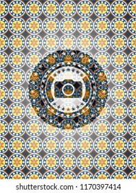 photo camera icon inside arabic badge background. Arabesque decoration.