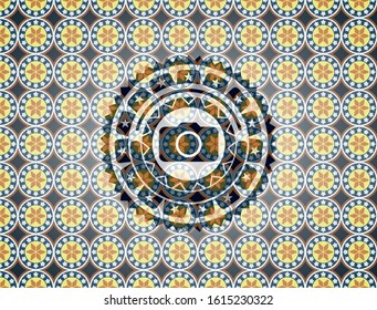 photo camera icon inside arabic badge. Arabesque decoration.