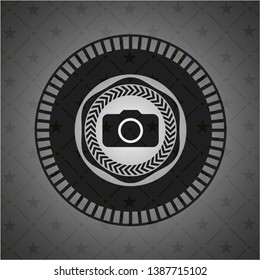photo camera icon inside black badge