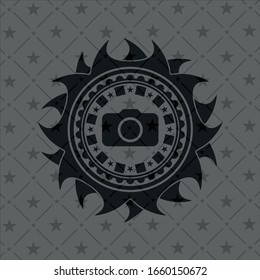 photo camera icon inside black badge