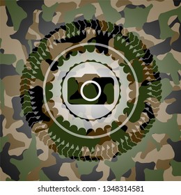 photo camera icon inside camo emblem