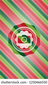 photo camera icon inside christmas emblem background.
