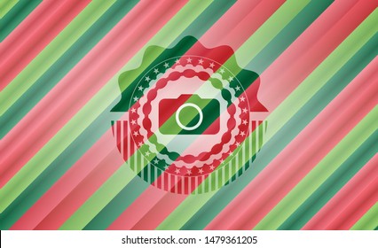 photo camera icon inside christmas emblem background.