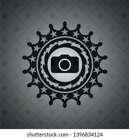 photo camera icon inside dark emblem