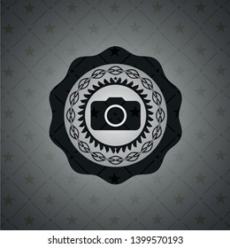 photo camera icon inside dark emblem. Retro
