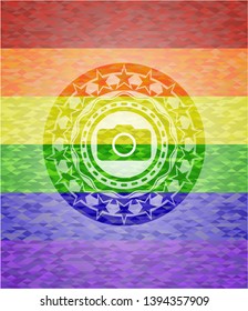 photo camera icon inside emblem on mosaic background with the colors of the LGBT flag