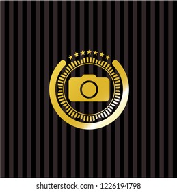 photo camera icon inside golden emblem or badge