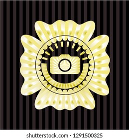 photo camera icon inside golden badge