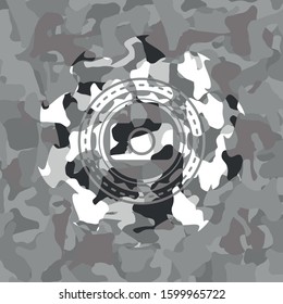 photo camera icon inside grey camo emblem