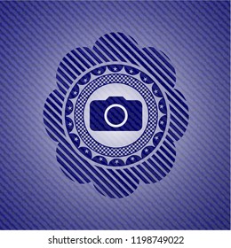 photo camera icon inside jean background