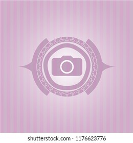 photo camera icon inside pink icon or emblem