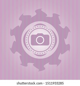 photo camera icon inside pink icon or emblem