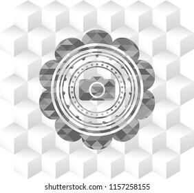  photo camera icon inside realistic grey emblem with geometric cube white background