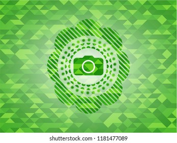 photo camera icon inside realistic green mosaic emblem
