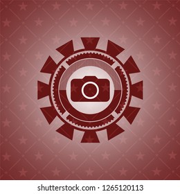 photo camera icon inside realistic red emblem