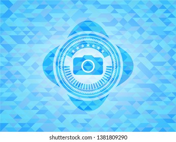 photo camera icon inside realistic sky blue mosaic emblem
