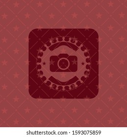 photo camera icon inside realistic red emblem