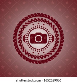 photo camera icon inside realistic red emblem
