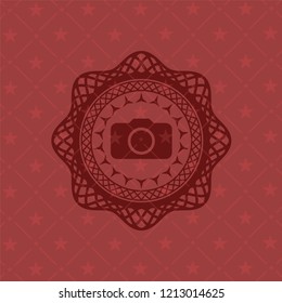 photo camera icon inside red emblem. Vintage.