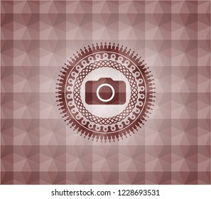 photo camera icon inside red seamless polygonal badge.