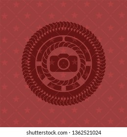photo camera icon inside red emblem. Retro