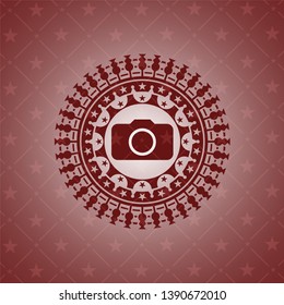 photo camera icon inside red emblem. Vintage.