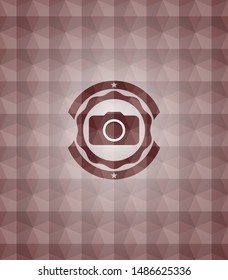 photo camera icon inside red emblem with geometric pattern. Seamless.