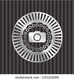 photo camera icon inside silver emblem or badge
