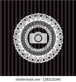photo camera icon inside silver badge