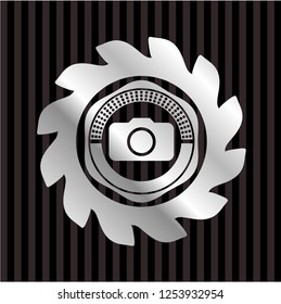 photo camera icon inside silvery badge or emblem