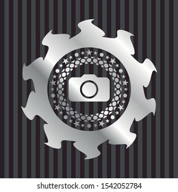 photo camera icon inside silvery emblem or badge
