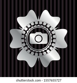 photo camera icon inside silvery badge or emblem
