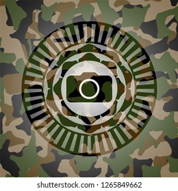 photo camera icon on camo texture