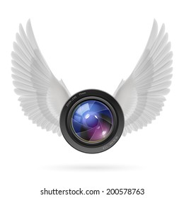 Photo camera lens with white wings emblem