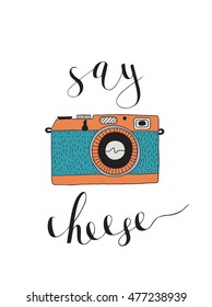 Photo camera with lettering - Say cheese. Vector hand drawn illustration.
