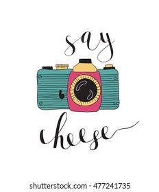 Photo camera with lettering - Say cheese. Vector hand drawn illustration.
