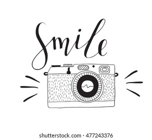Photo camera with lettering - Smile. Vector hand drawn illustration.