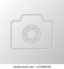 Photo camera, linear symbol with thin outline, simple icon. Paper design. Cutted symbol. Pitted style