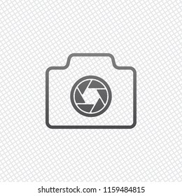 Photo camera, linear symbol with thin outline, simple icon. On grid background